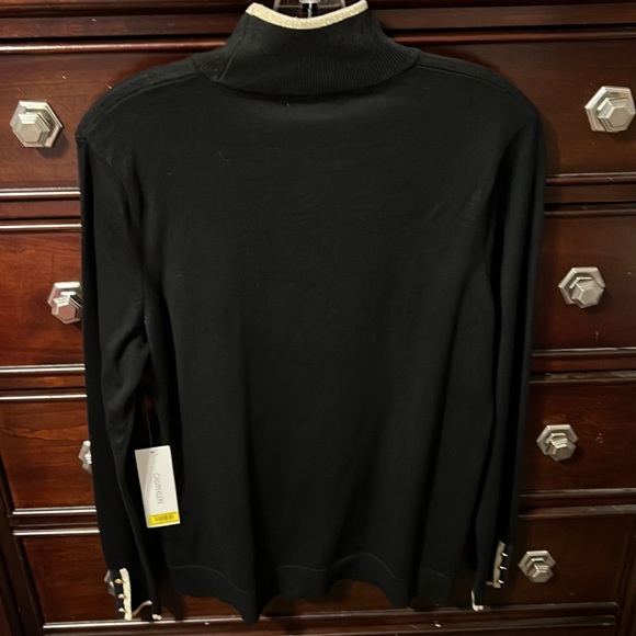Calvin Klein S P black with gold trim and gold buttons on sleeves. - Picture 4 of 5